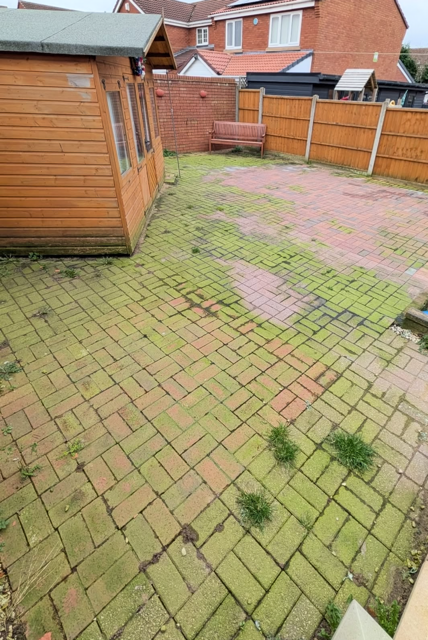 Patio pavers before pressure washing