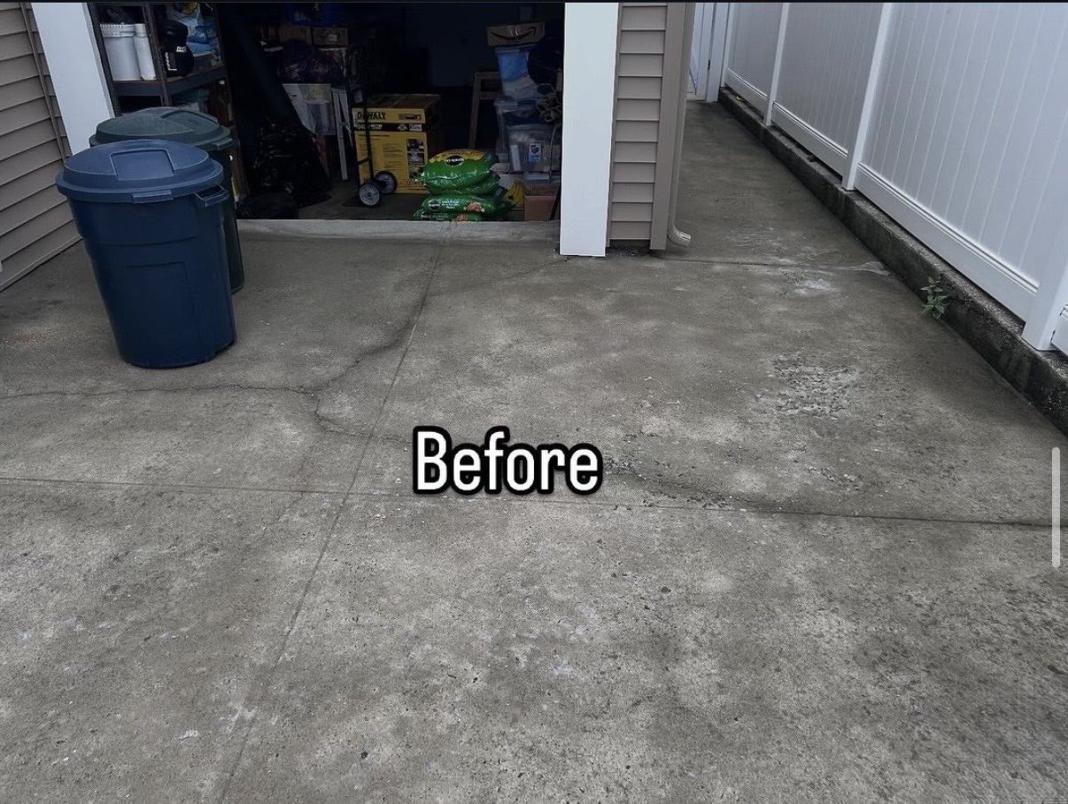 Concrete patio before pressure washing in Charlotte